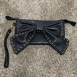 Charming Charlie Black Bow Wristlet Gold Accents